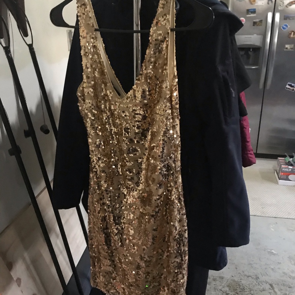 Women’s gold sequence dress